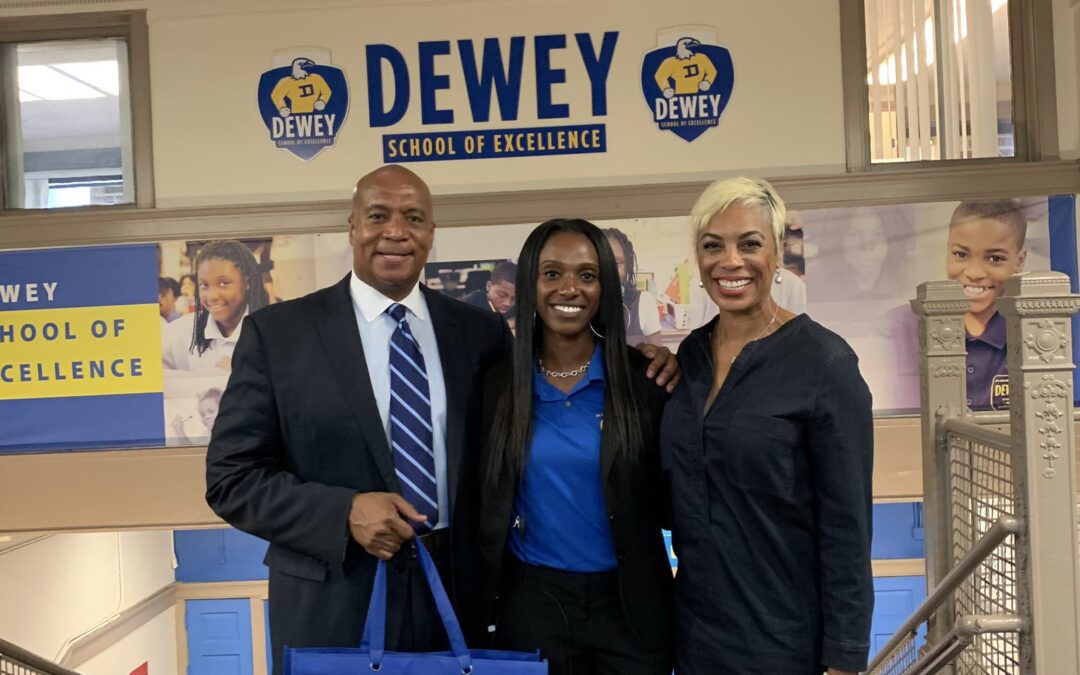 Warren Family Foundation Donates Uniforms to Dewey School of Excellence
